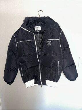 CHANEL Black Puffer Jacket with White Trim